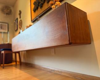 Danish inspired walnut cantilevered sideboard hand made by our client in 1969. Overall measurements are 72”W x 14 1/2”D x 13 1/2”T. This piece was featured in ‘Nomadic Furniture 2 - James Hennessy and Victor Papanek’