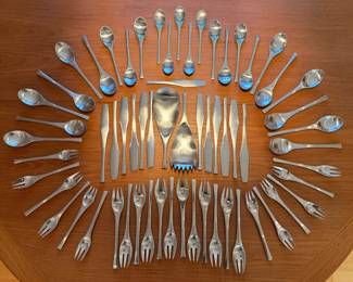 63 piece set of vintage Dansk ‘Odin’ stainless steel flatware. This set comes in four custom smokey black acrylic cases, two have custom walnut insterts