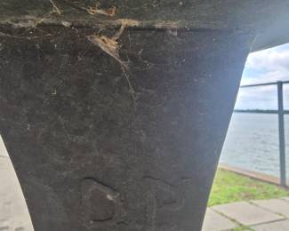 D. P. signature on the birdbath