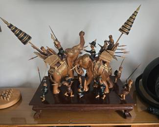 Intricate high-quality wood carved Battle of Elephants. 