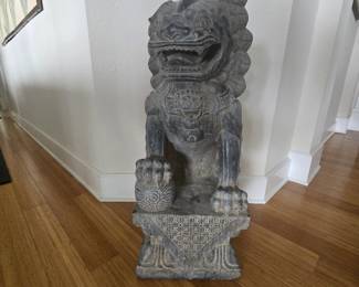 This is the male Foo Dog.  We have both the male and female foo dog (artistic interpretations of lions).  Approximately 3 feet tall. Appears to be made of very heavy marble.  Believed to protect your home from evil spirits and people. 