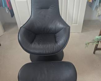 Fun black leather chair and ottoman
