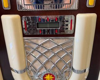 	#70	Cosley Juke Box model #CR-12-3 It Works!	 $980.00 				