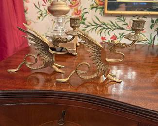 	#14	A pair of brass Dragon candle sticks	 $65.00 				