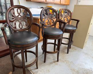 	#73	Swivel Bar Stools with leather seats set of 3 29"H	 $120.00 				