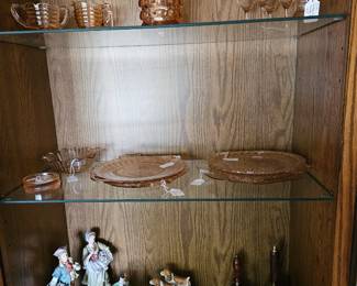 Depression glass, figurines, bells.