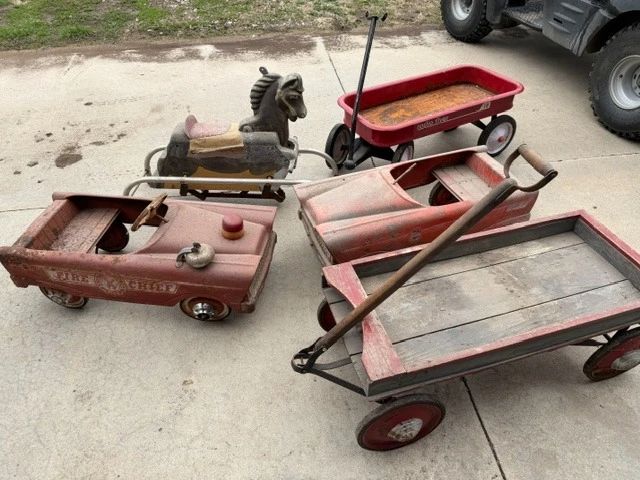 Pedal cars. Wagons. Aluminum rocking horse.