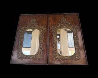 Pair of large carved mirrors