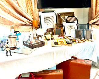 Assorted decor items and vintage briefcases and suitcase (hard-sided)