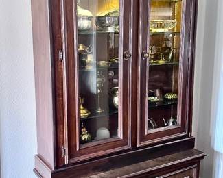 Tall double door lighted curio cabinet 