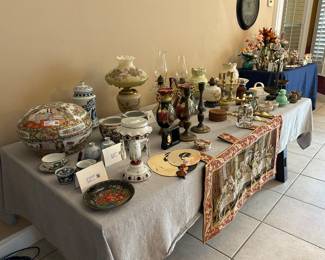 Oriental items, oil lamps, candle sticks, pitcher and bowl and more.