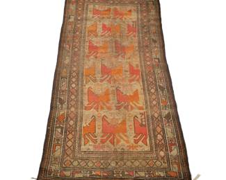 VINTAGE TURKISH (ANATOLIAN) HAND-KNOTTED WOOL RUNNER | Circa early 20th century, possibly Anatolian. Hand-knotted wool runner with a central field of repeating angular bird/gul motifs in orange and coral on a muted beige ground, surrounded by multiple geometric borders in brown, tan and rose. Construction shows hand-woven warp and weft visible on the verso, with short knotted fringe at each end and selvage edges. Overall low-pile, flat appearance with visible weave structure.