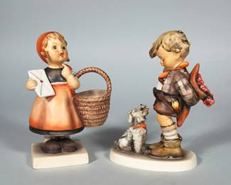 (3pc) HUMMEL FIGURINES | Pair of hand-painted porcelain Hummel-style figurines: one girl holding an envelope with a woven basket on a square base, and a boy with a small dog on an oval base. Both figures are polychrome glazed with matte shading and detailed hand-painted facial features and clothing. 