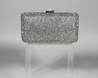 SONDRA ROBERTS RHINESTONE ENCRUSTED BOX CLUTCH | Rectangular metal-frame box clutch fully covered in clear round rhinestones with a faceted rectangular push-clasp. Interior is lined in black satin and labeled "SONDRA ROBERTS" and contains a removable snake-style chain shoulder strap.