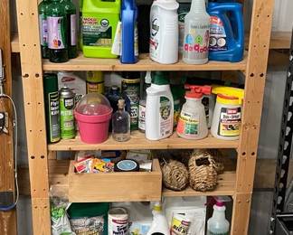 Wood Shelf Full Of Gardening Supplies Including Fertilizer Seed Packs Yard Decor