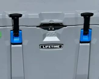 Lifetime 77-quart heavy-duty cooler in good condition. Built for durability and extended ice retention, comparable to premium brands at a more affordable level.    Details:  Brand: Lifetime Capacity: 77 Quart Color: Gray with blue accents IGBC Bear-Resistant Certified Made in USA Heavy-duty roto-molded style construction Secure latches and reinforced handles Built-in drain plug for easy emptying   Condition:  Clean interior Latches, handles, and drain plug all present and functional Light exterior wear consistent with normal use (see photos) No major cracks or structural damage observed   Note:  Pre-owned and ready for immediate use.