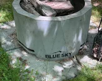 Roast Some Marshmallows On Your Blue Sky Fire Pit. Fire pit is 26 inches diameter inside and 31 inches outside. Located in the backyard. comes with cover.