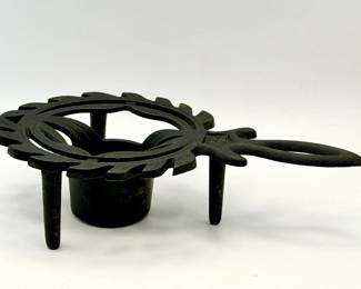 vintage cast iron tea light trivet