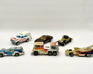 Summer, Majorette & Kenner Die Cast Toy Cars Majorette Jeep Cherokee Ambulance (model #269) diecast toy car 1980 Pontiac Trans Am Majorette diecast toy car Summer model No. S69 rolls royce die cast car 1980 Kenner Fast 111's "Cyclone" die-cast race car 1980 Kenner Fast 111's Evil Eye Stunt Rig. 1981 Kenner "Fast 111's" "Pipe N Hot" diecast toy car. \n