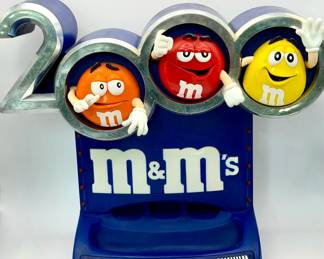 vintage 2000 M&M's "Official Candy of the New Millennium" candy dispenser.