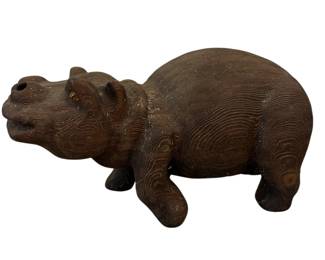 A Carved Wood Hippopotamus Sculpture