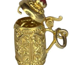 An 18k Gold & Ruby German Stein Charm, Opens