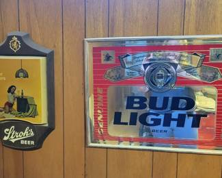 Stroh's sign and Bud Light mirror