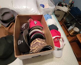 large collection of ball caps