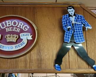Tubor beer signs and Elvis Presley clock