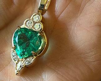 14K pendant by Linda Joslen $8,000 3c heart shaped Emerald!