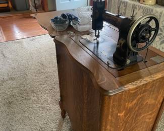 White’s Rotary sewing cabinet with antique machine