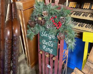 Vintage sled with holiday decor