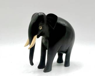 Vintage Hand-Carved Elephant Figurine with Inlaid Bone Tusks