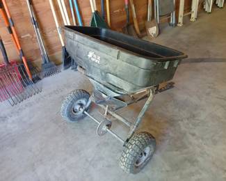 Pull behind spreader