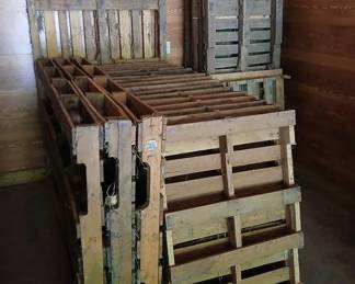 Many wooden pallets