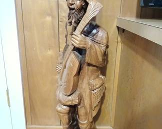 Carved wood statue