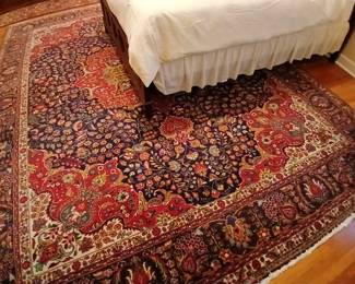 The rug measures 10 ft. x 12.5 ft.