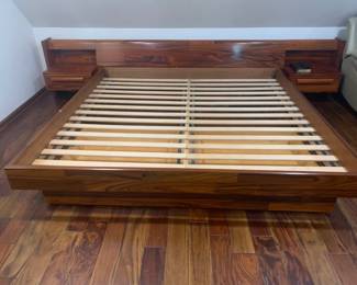 Vintage Danish Modern rosewood veneer king platform bed with floating nightstands, integrated headboard and storage and 