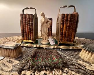 Leather bound Judaica, beaded handbags from the 1920's and sterling childrens' brushes
