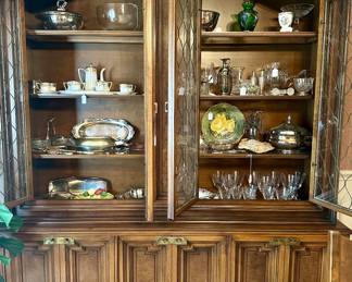 Large breakfront which matches table and chairs - loaded with bits and pieces from all around the house.