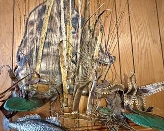 Fantastic metal hanging with seafood and amazing coastal frivolity - came from New Orleans