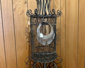 Curious metal birdcage