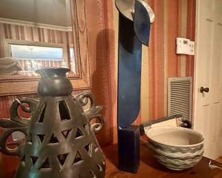 Pottery and sculptures of metal