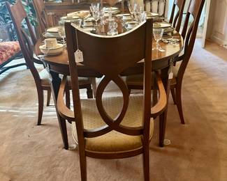 Terrific dining table and chairs with leaves - circa 1970 - in beautiful condition.  Two host chairs and four side chairs
