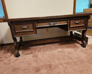 $1000 Pickup in Huntsville NOT at the Priceville House pre sale item  SOLID wood statement piece. Very heavy and extremely sturdy. Multiple strong men job to move this piece of furniture.   Desk  30 1/2" D x 67 1/2" L x 30" H  Middle drawer 23 1/2" D x 22 1/2" W x 3" H  Side drawer x 2 23 1/2" D x 11" W x 5" H