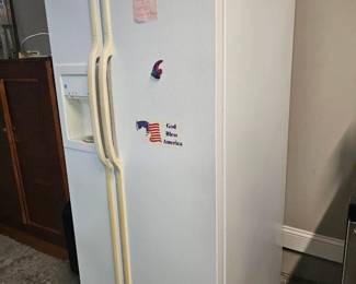 $200 Priceville Pickup GE Side by Side Refrigerator  30" D x 31 1/2" W x 67" H Both ice and water works as should. House is for sale and all appliances were replaced before listing. Needs cleaned.