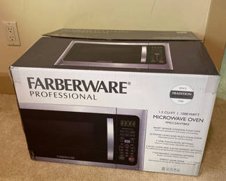 Lot 88: NEW - Microwave Oven in Box