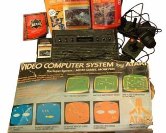 322 - Atari 2600 Video Game System w/ Controller's (Description): Games & Box Used as is electric/electronic/mechanical  item. No guarantee all components, untested.