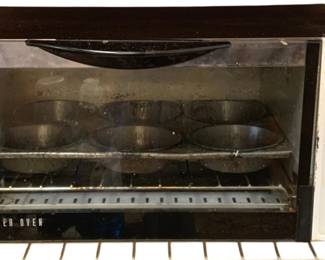 122 - Toaster Oven - 9 x 15 x 7 (Description): Used as is electric/electronic/mechanical  item. No guarantee all components, untested.