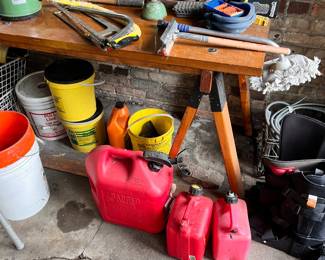 Garage loaded with electric yard tools 
